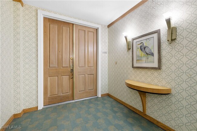 Building Photo - 7515 Pelican Bay Blvd