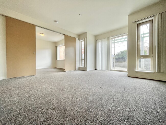 living room + bedroom with sliding double doors - Capitol Court