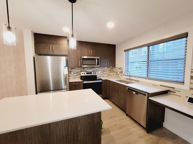 Building Photo - 3025-3151 151 Avenue Northwest