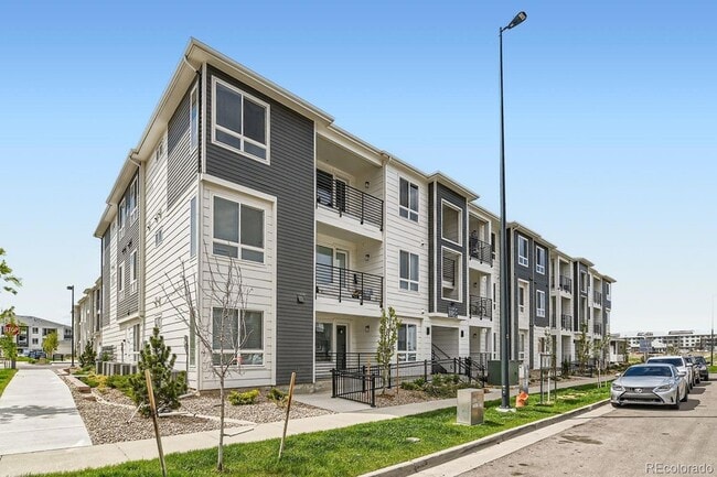 Photo - 6153 N Ceylon Street Unit 10-303 Apartment