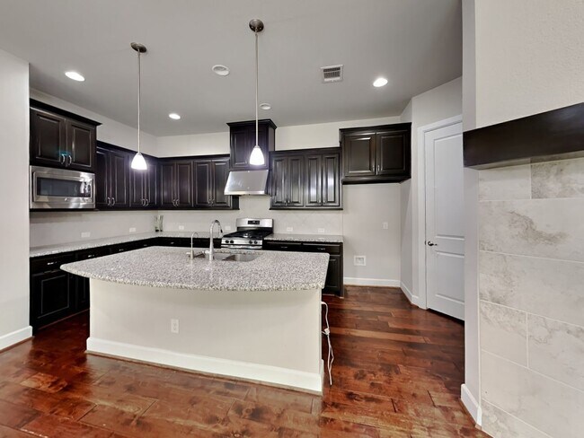 Building Photo - Breathtaking 4-bedroom home in the highly ...