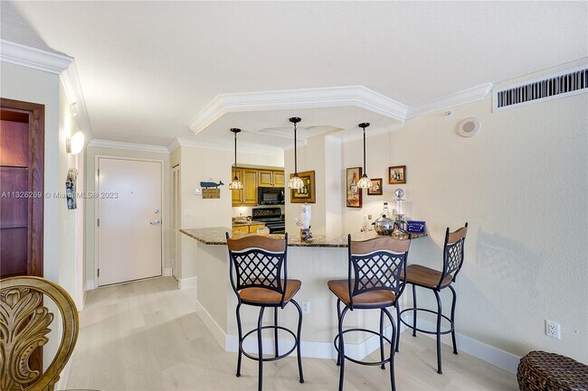 Building Photo - 6917 Collins Ave