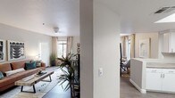 Located at 1100 E Osborn Rd in Phoenix, Arizona, this single-floor residence offers a thoughtfully designed layout with modern finishes throughout. The open-concept living and dining areas are bathed in natural light, courtesy of large windows dressed with neutral curtains and blinds. The living room features wood-look flooring, a contemporary seating arrangement, and curated wall art, creating a welcoming and stylish atmosphere.

The dining area comfortably accommodates a full-sized table and benefits from an oversized window that further enhances the bright, airy feel of the space. The kitchen is well-equipped with white cabinetry, subway tile backsplash, black appliances including a range, built-in microwave, and dishwasher, along with a skylight that adds additional natural light and stone-look countertops.

The bedrooms are generously sized, each featuring wood-look flooring, large windows with blinds and drapes, and ceiling fans for comfort. One bedroom offers direct access to an outdoor area through sliding glass doors. The bathrooms are clean and functional, each featuring a tub-shower combination, wood-look flooring, and vanities with stone-look countertops. Consistent finishes and a neutral color palette unify the space throughout.