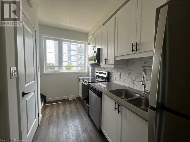 Photo du bâtiment - 650 Victoria St S