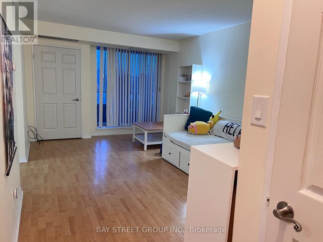 Building Photo - 303-335 EMPRESS Ave