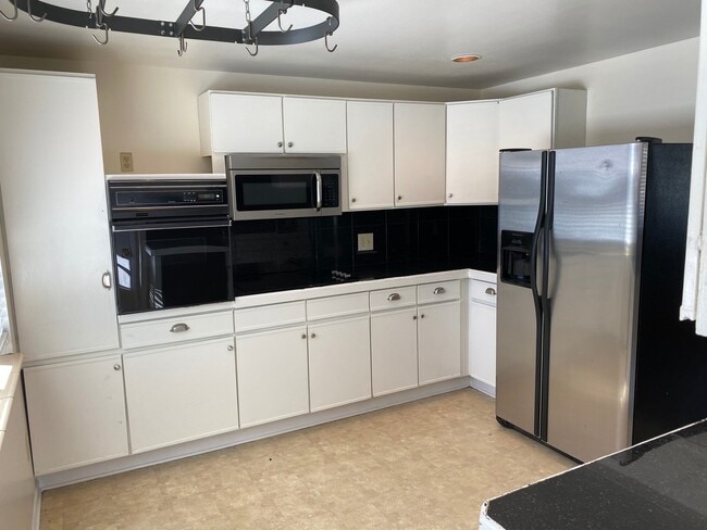 Building Photo - BRICK RANCH, FINISHED BASEMENT, CORNER LOT...