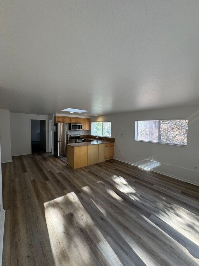 Building Photo - Charming Riverfront Cottage in Verdi – One...