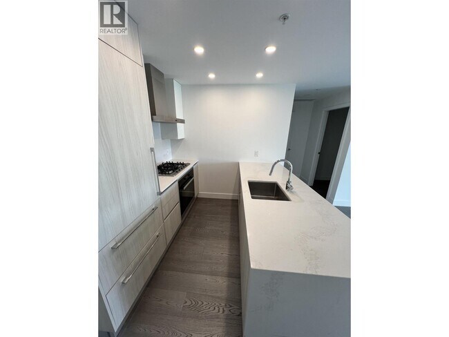 Photo du bâtiment - 477-477 W 59th Ave