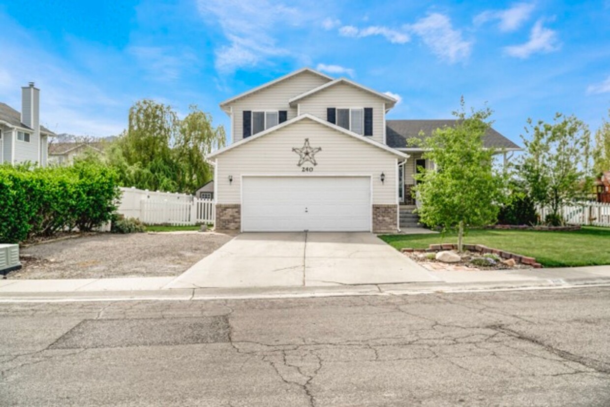 Primary Photo - 4 Bedroom Stansbury Park Home