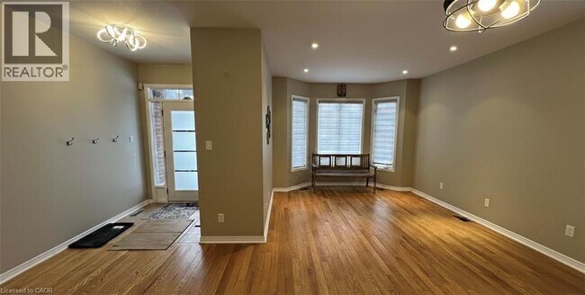 Building Photo - 501 Topper Woods Crescent