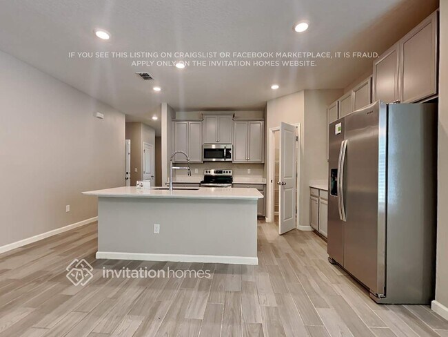Foto del edificio - 9822 Lemon Grass Ln