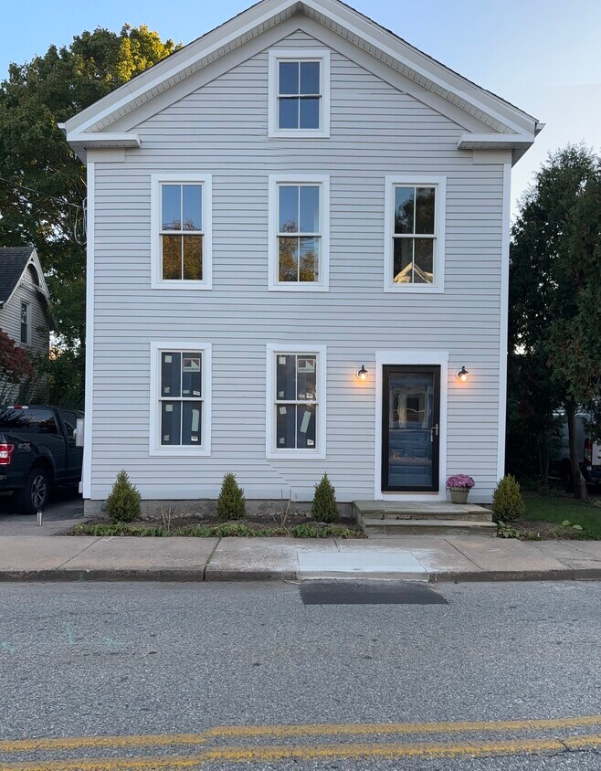 Newly restored original clapboard, freshly painted all new windows - 47 Trumbull Ave