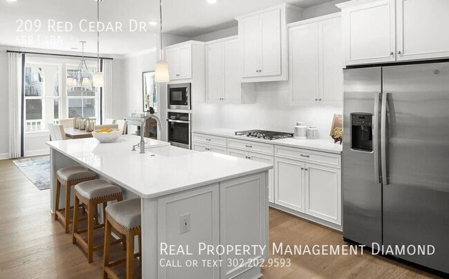 Building Photo - 209 Red Cedar Dr