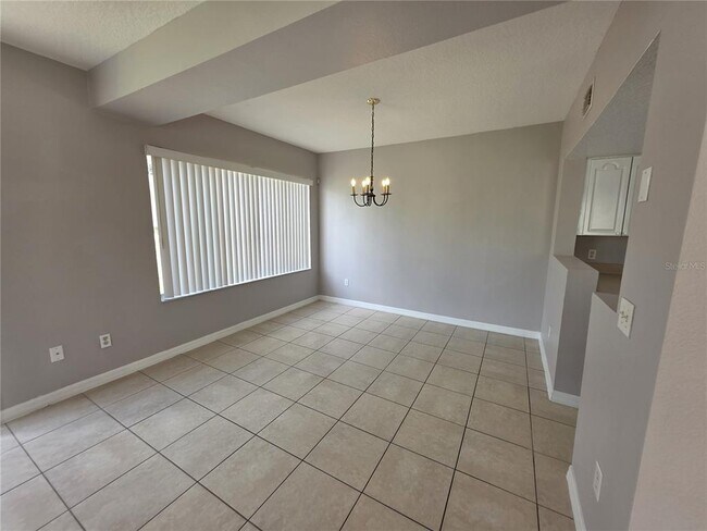 Building Photo - 406 Washington Palm Loop