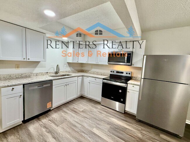 Foto del edificio - 2 Bedroom Condo with Private Patio