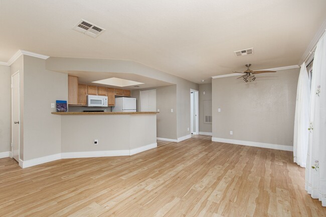 Building Photo - Remodeled first floor unit in gated commun...