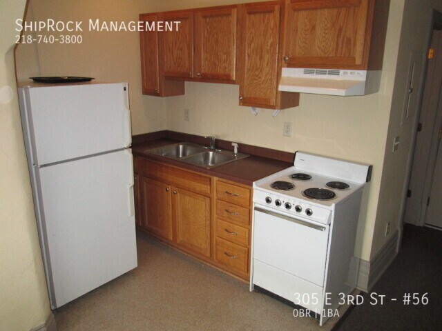 Foto del edificio - 305 E 3rd St