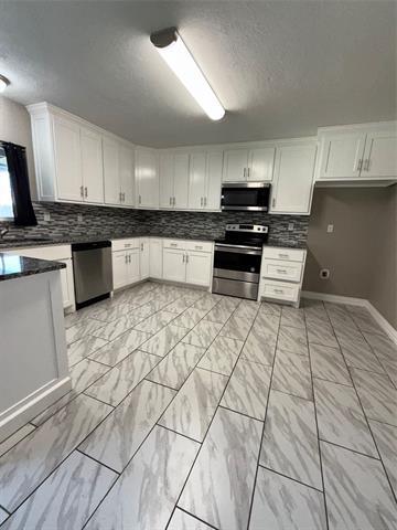 Building Photo - 6809 Greenspring Dr