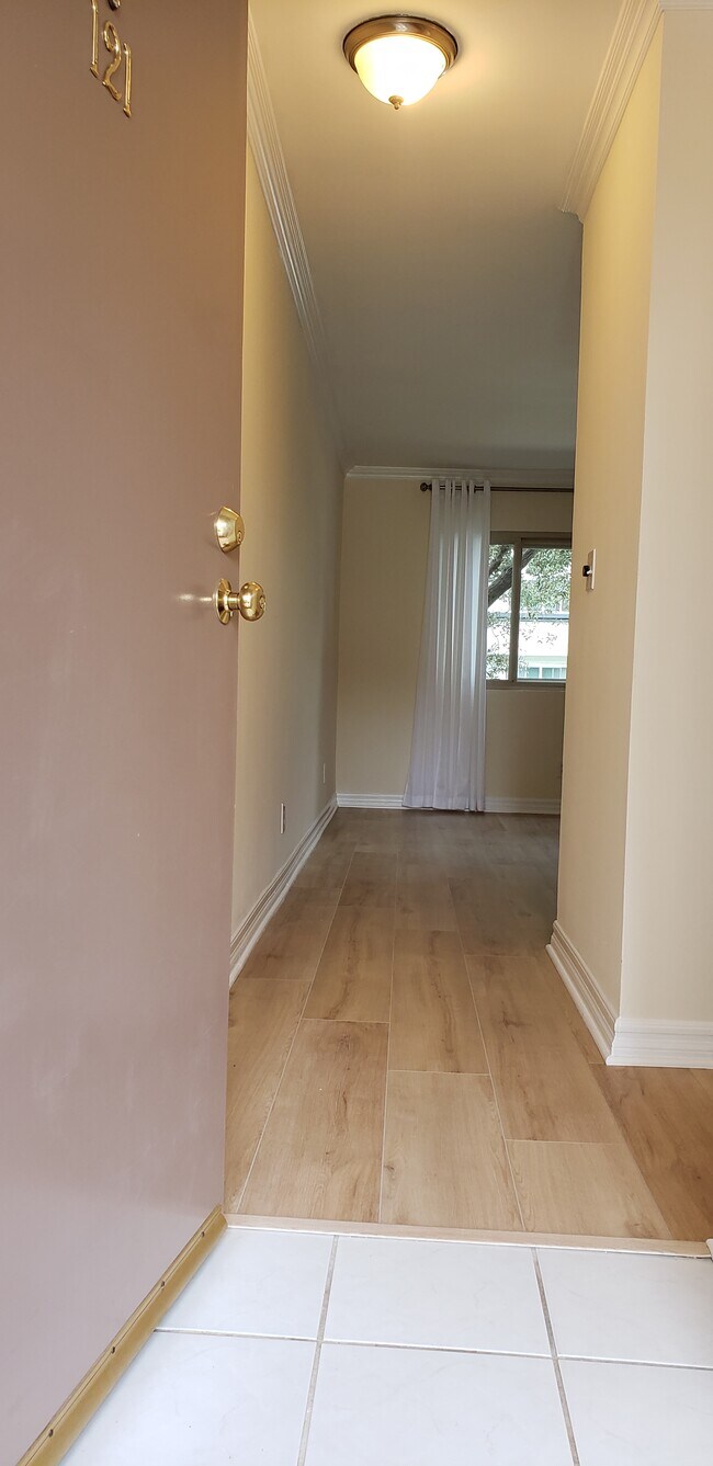 Front Door Entry of Condo - 8710 Belford Ave