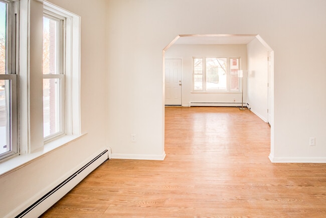 Great Living/Dining room with front porch! - 1830 E 101st St