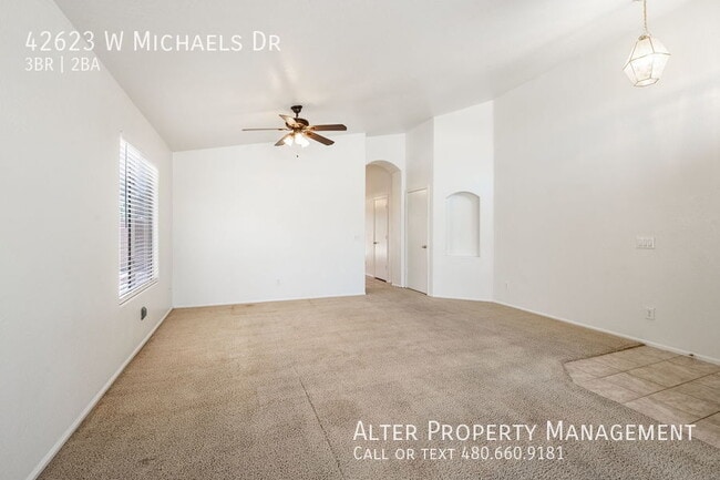 Building Photo - 42623 W Michaels Dr