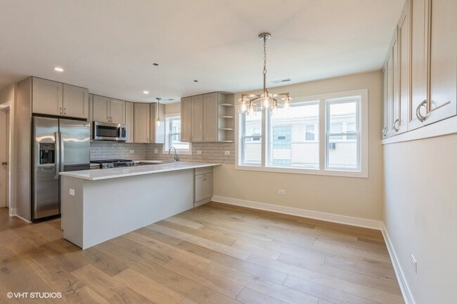 Building Photo - 7026 W Diversey Ave