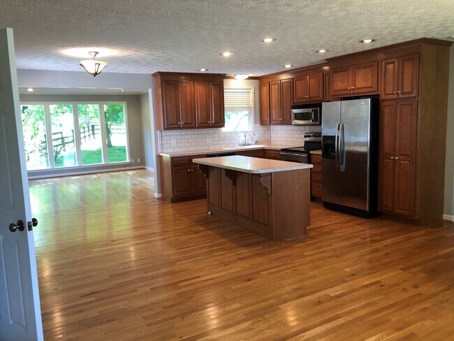 Open floor plan - Kitchen, living and sun room - 8171 Horton Hwy
