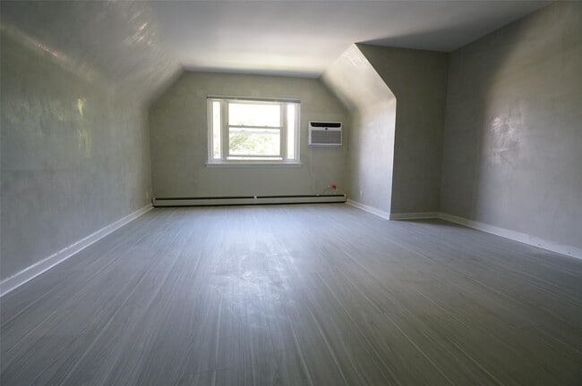 Building Photo - 203-12 42nd Ave