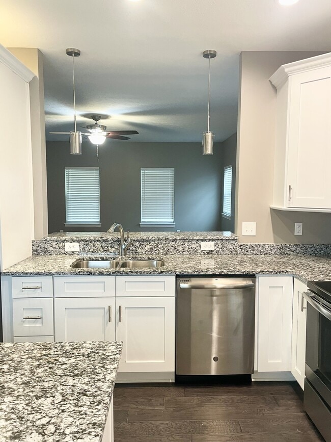 Kitchen view to living room - 6157 Winthrop Ave