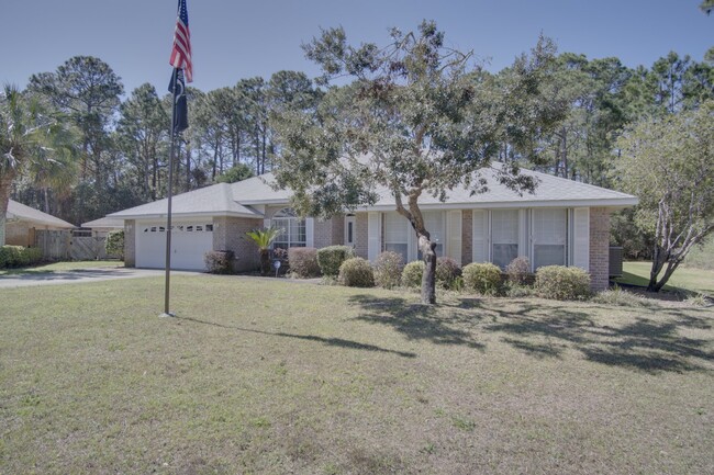 Building Photo - 4 bedroom 3 bathroom brick home in Gulf Br...