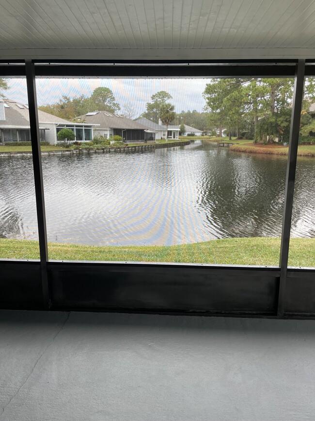 Screened patio. Edge of the lake. Best feature of this property - 144 Abaco Way