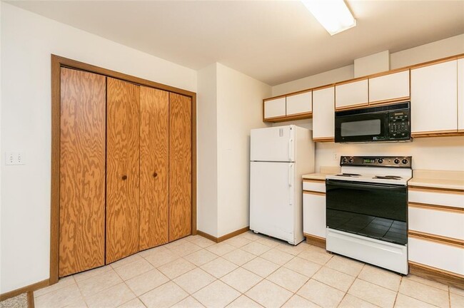 Washer and Dryer located behind bi-fold doors. - 72 Miller Ave SW