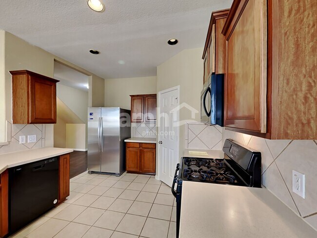 Foto del edificio - 15742 Flagstone Walk Way