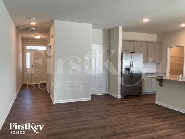 Foto del edificio - 10717 Rivergate Dr NW
