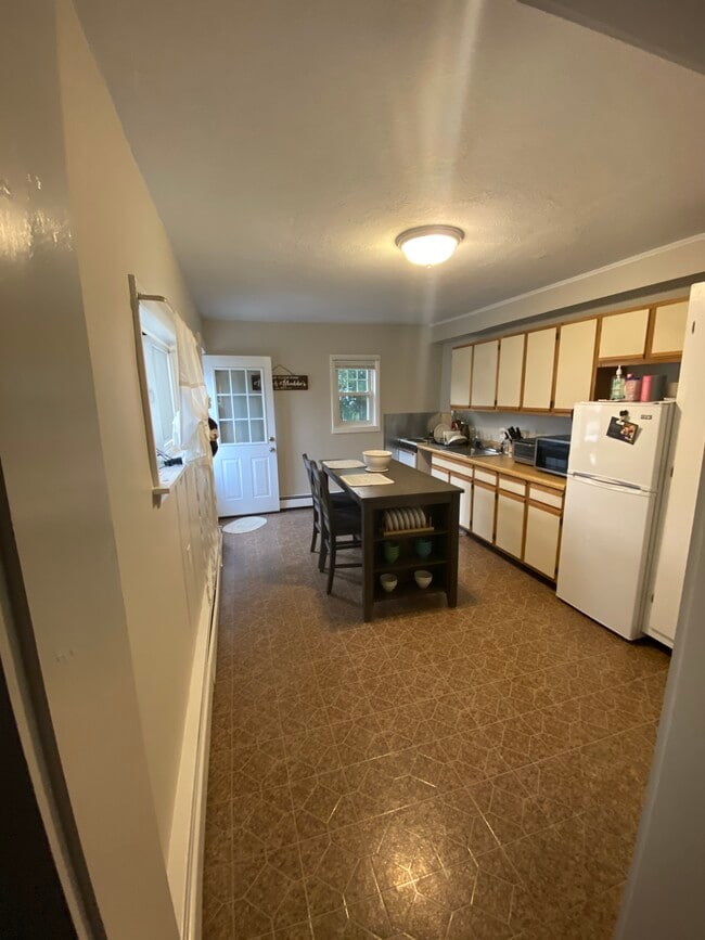 Spacious eat-in kitchen was just repainted - 74 Hammond St