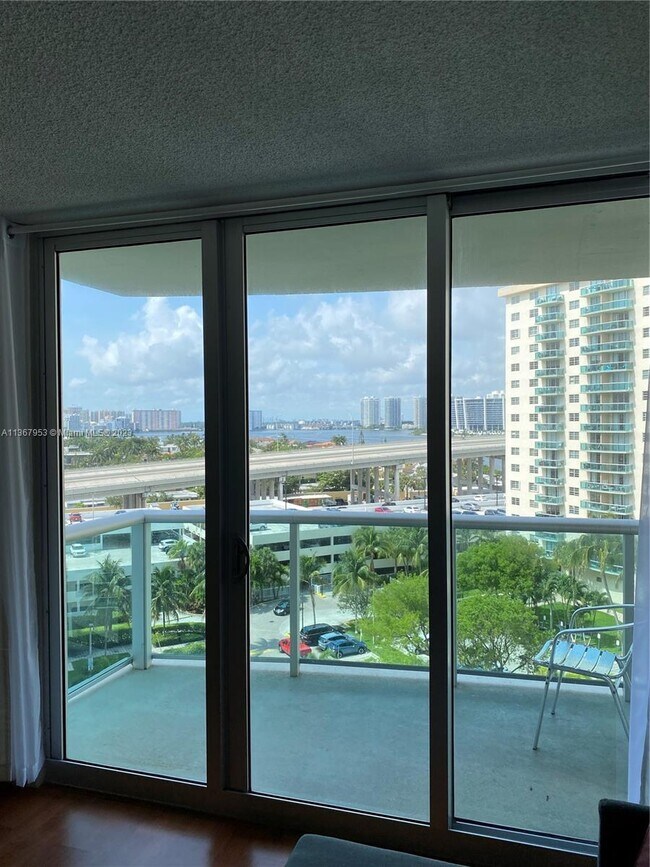 Building Photo - 19380 Collins Ave
