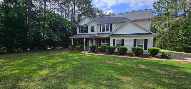 Building Photo - Commanding Curb Appeal, Conveniently Place
