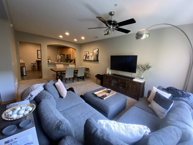 Large open floor plan with space for large dining room table. Ability to add bar stools to counter. - 13805 53rd Ave N