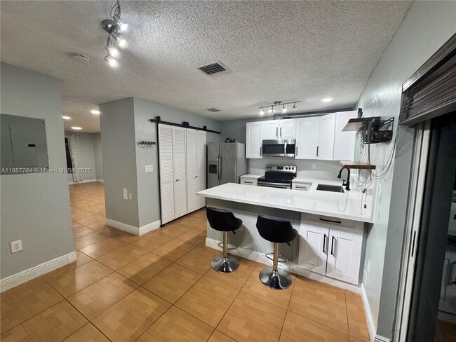Building Photo - 7005 NW 173rd Dr