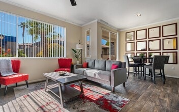 Living and dining share one long room with the window at the near end. - Mountainside