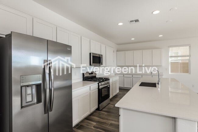 Foto del edificio - 10115 E Ulysses Ave