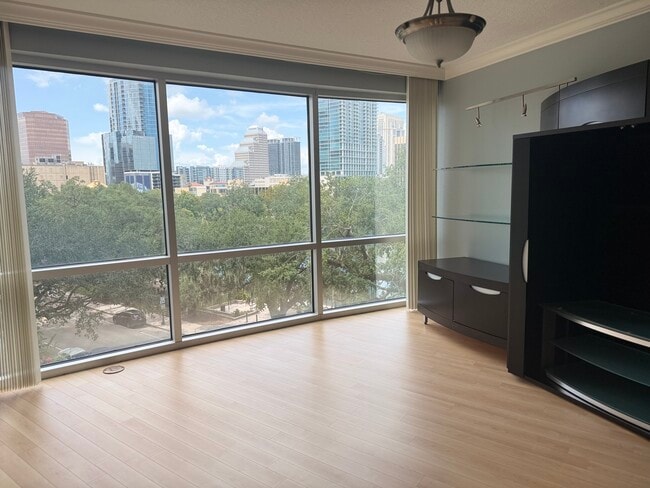 Livig room blinds open - 322 E Central (Orlando, FL) Apartment