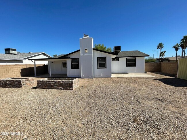 Foto del edificio - 10421 W Puget Ave