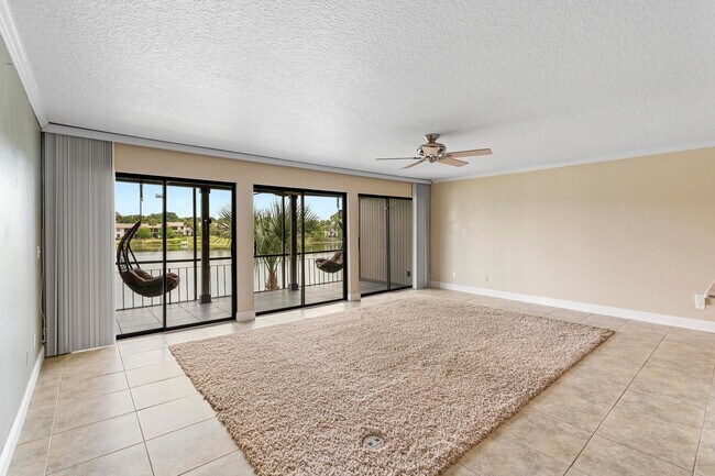 Building Photo - Lakefront lifestyle in this stunning 3-bed...