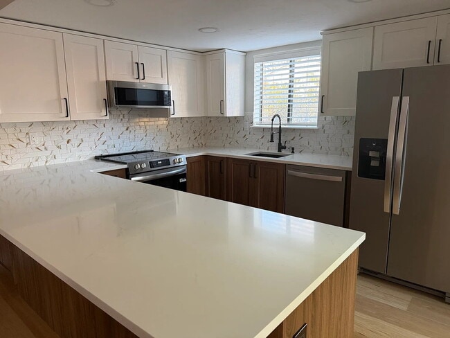 Photo - Newly Remodeled 1-Bed 1-Bath Townhome with Garage Parking – Available Now!