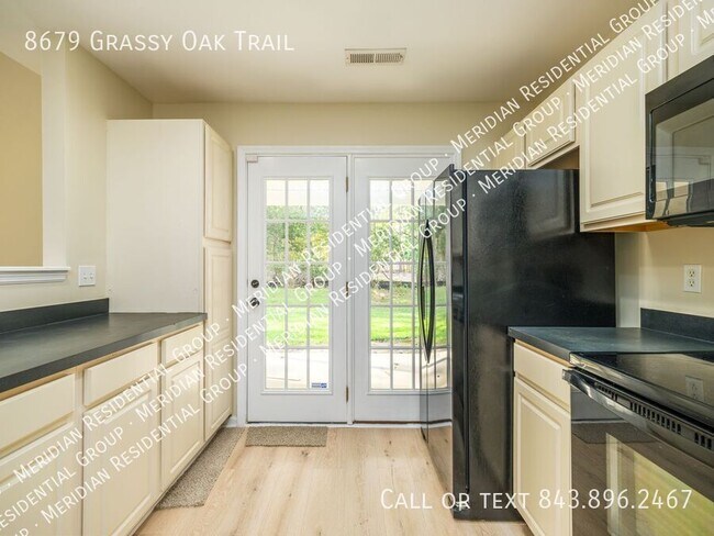 Foto del edificio - 8679 Grassy Oak Trail