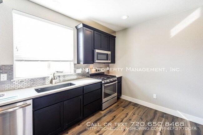 Foto del edificio - 9014 E 49th Pl