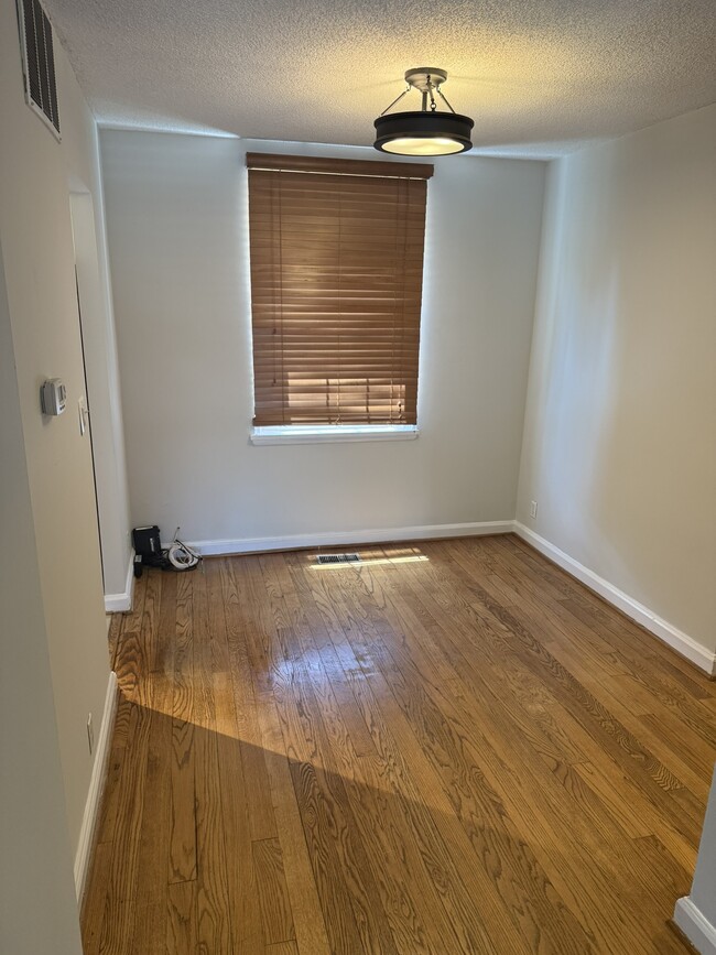 Dining room with new light fixture - 4218 35th St S