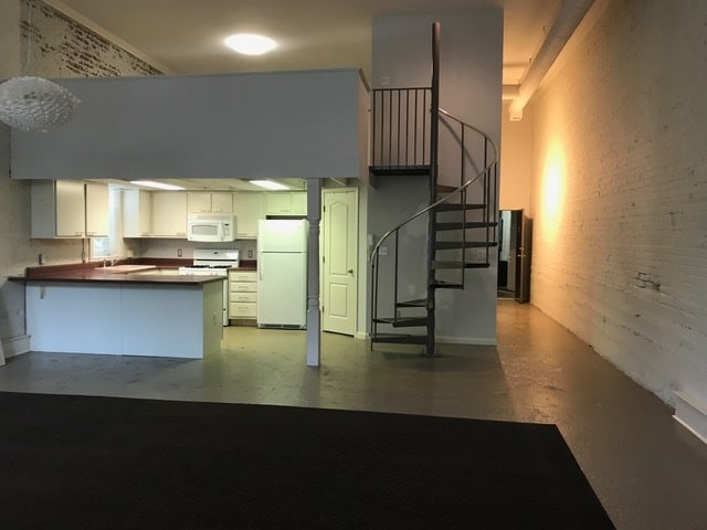 View of the Kitchen area & upstairs loft bedroom. - 505 S Main St (Memphis, TN)
