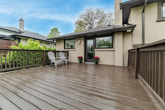 Generous deck space for hosting and outdoor events. - 2122 Truscott Dr